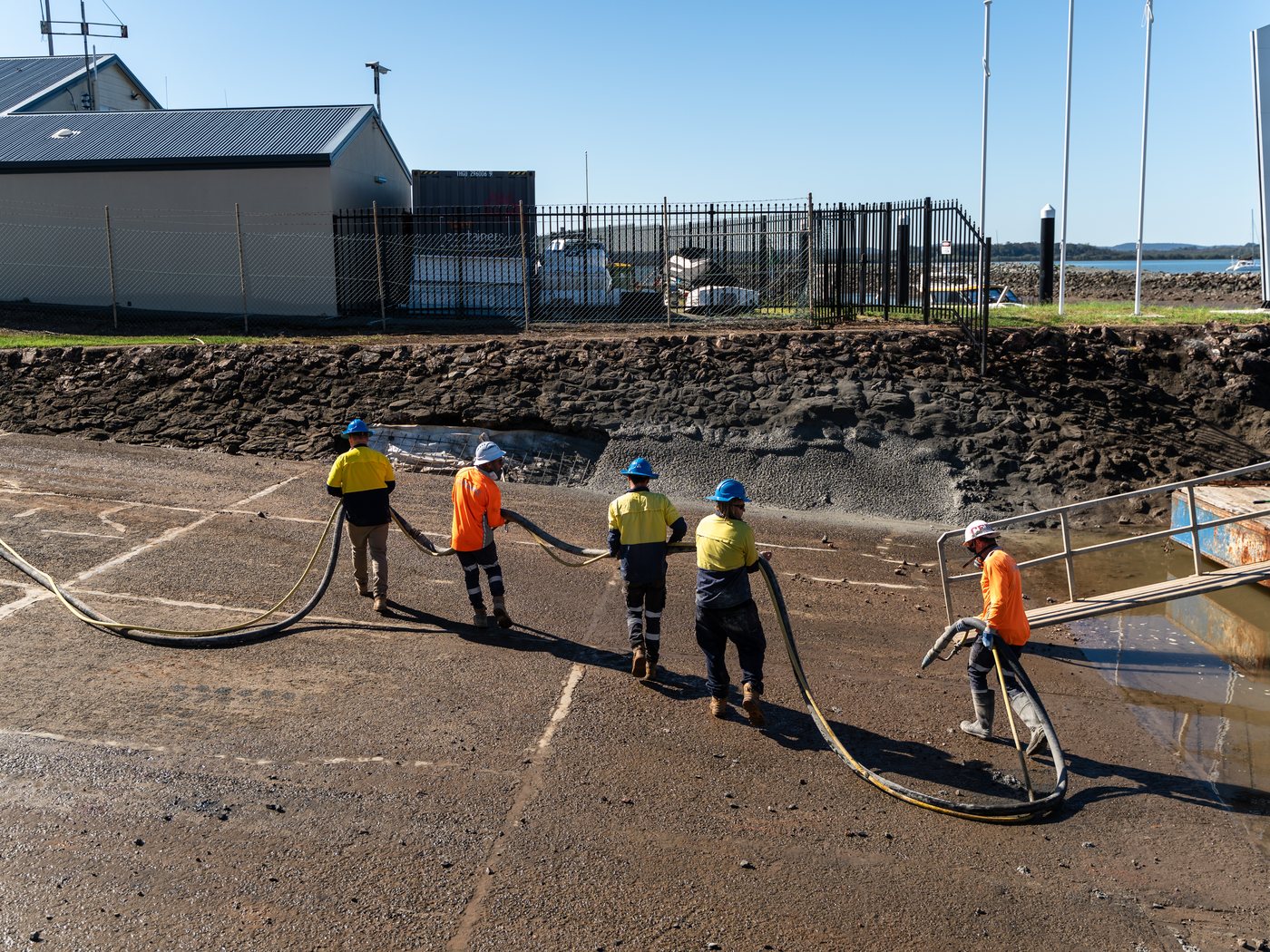 Two Pumpd line pumps and hose set up on a civil site