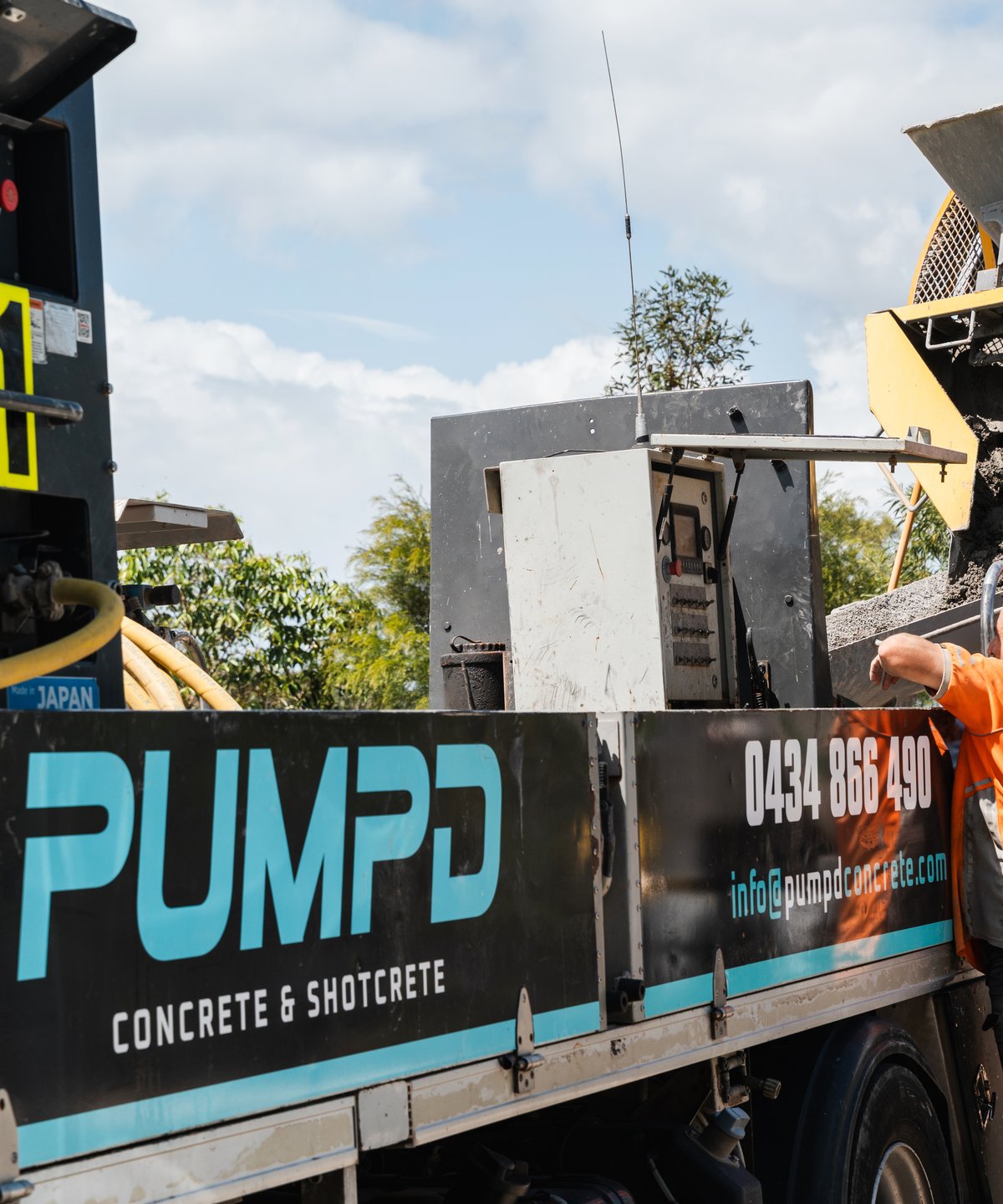 Concrete discharging from the agitator into the Pumpd line pump hopper